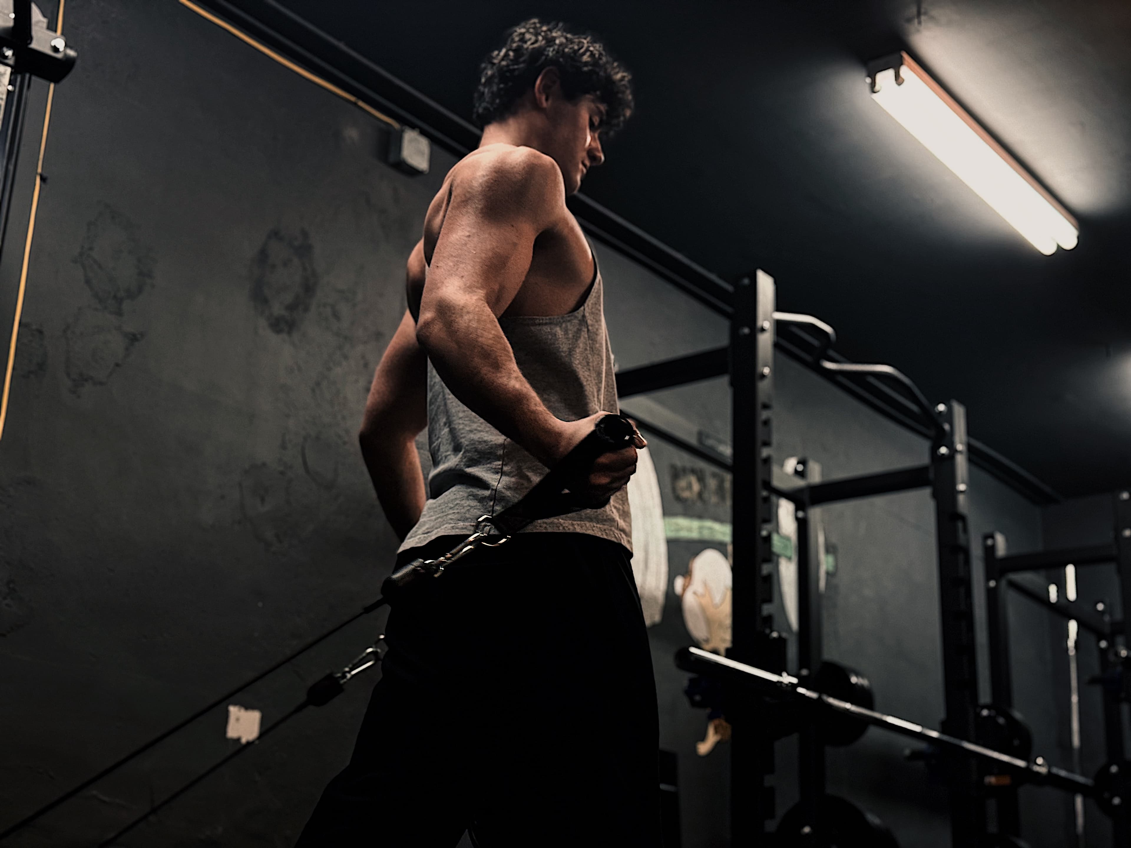Client performing a chest fly at BAM Fitness