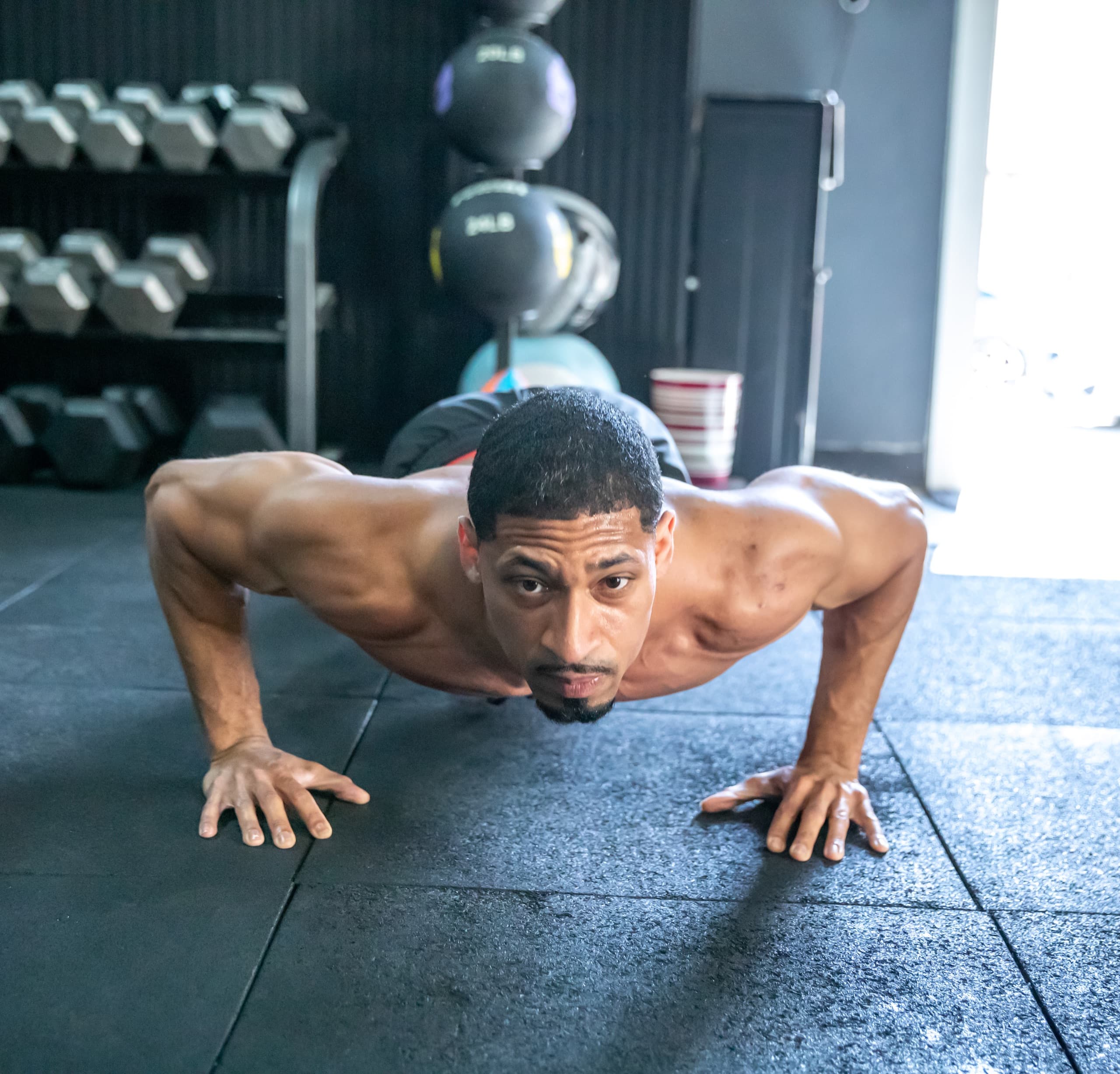Client doing push-ups during a one-on-one personal training session at BAM Fitness in Dumont, NJ