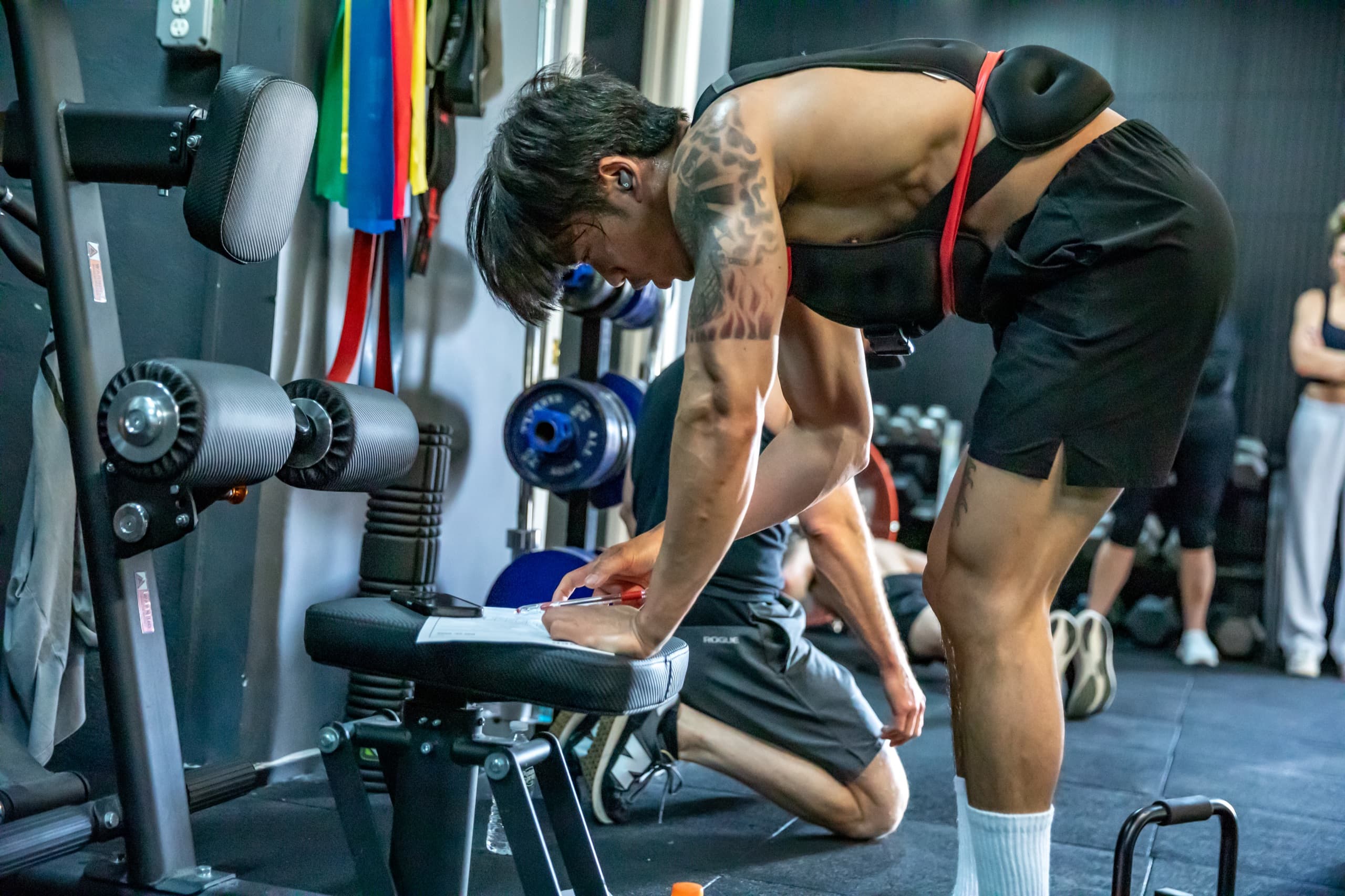 Client tracking their workout progress at the BAM Fitness studio in Dumont, NJ